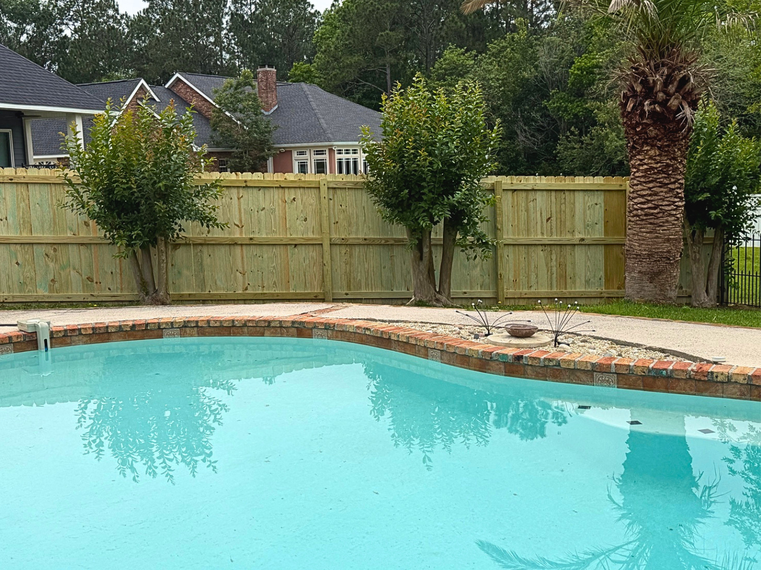 Poolside privacy fence project in Gulfport Mississippi