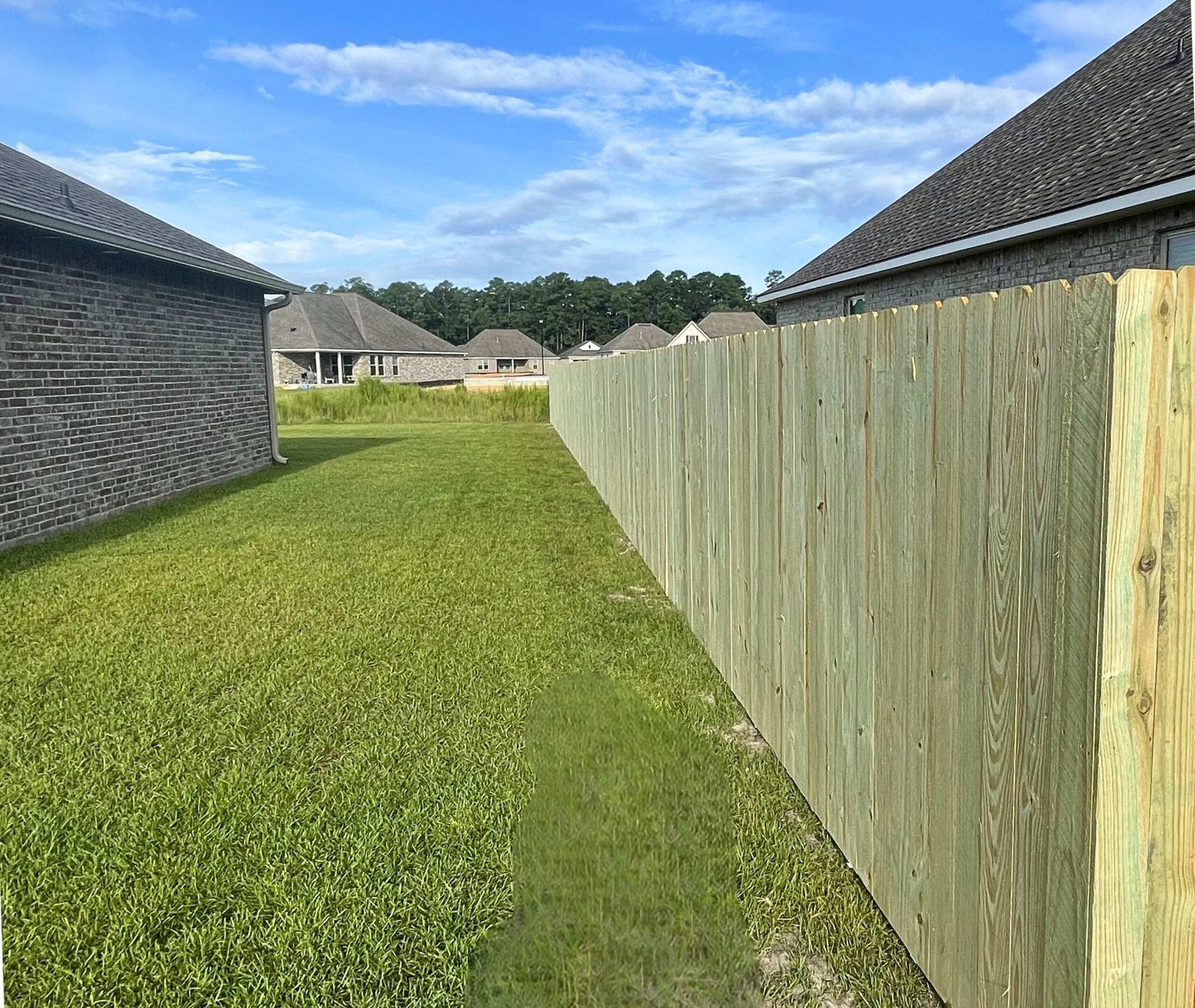 Standard wood privacy fence installation in Gulfport