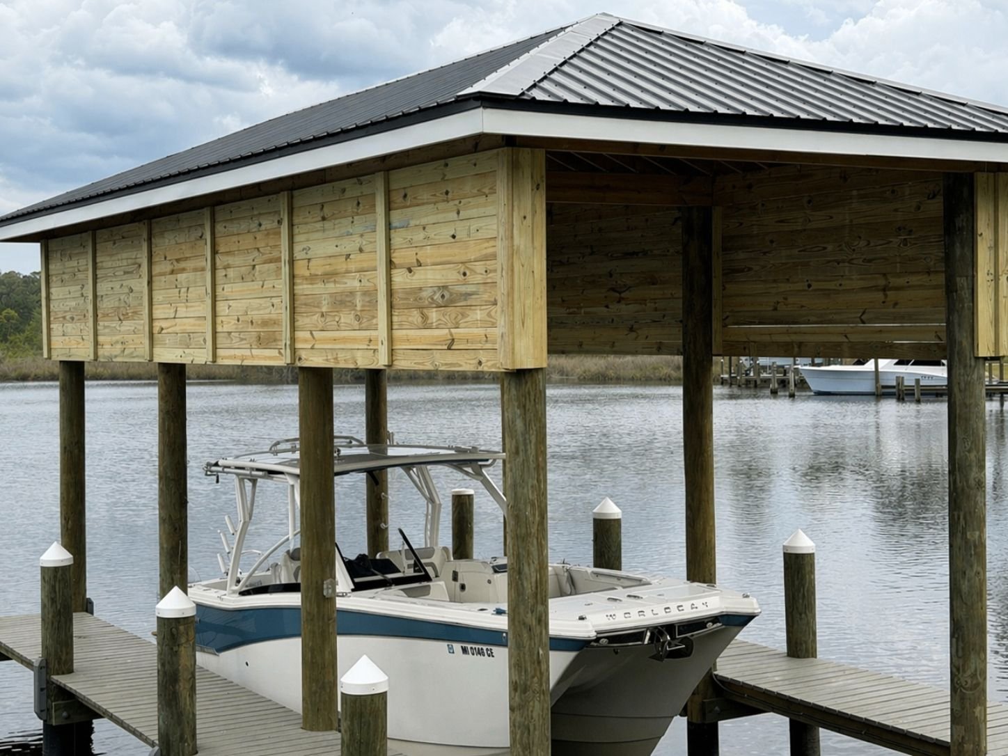 Boathouse weather screen and coastal outdoor structure on the Mississippi Gulf Coast