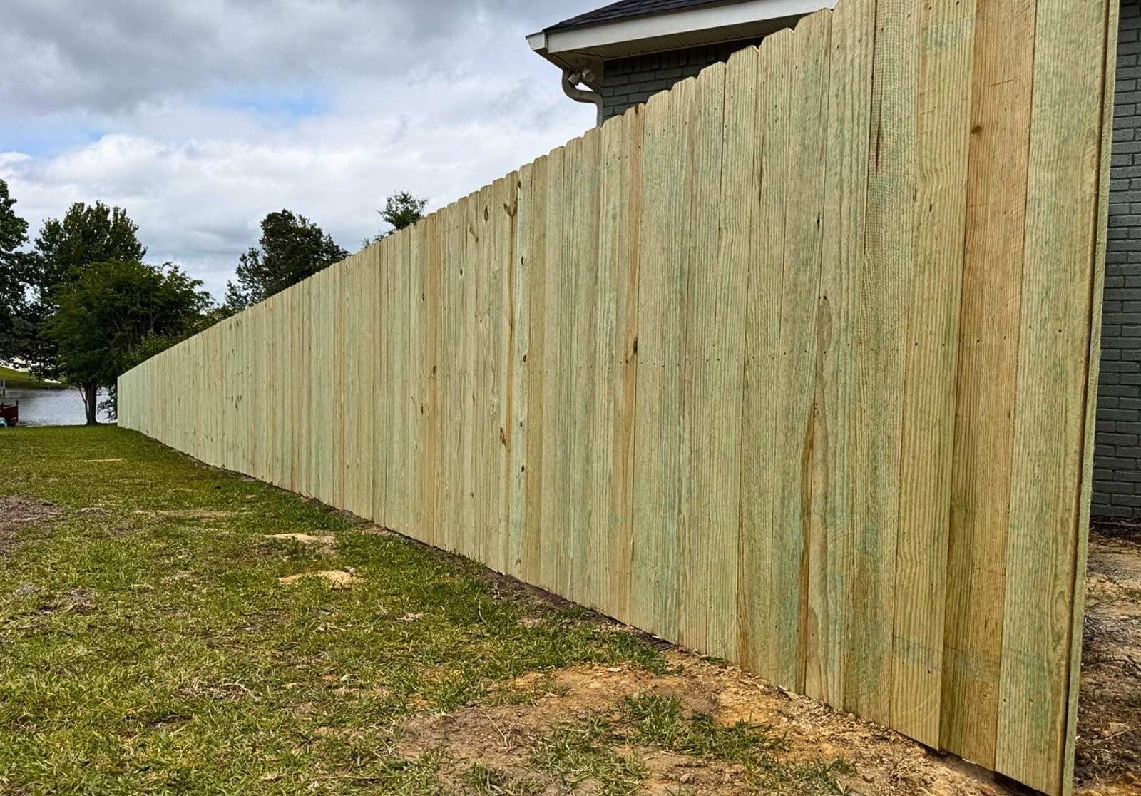 Long run privacy fence installation in Gulfport by Titan Fence & Deck